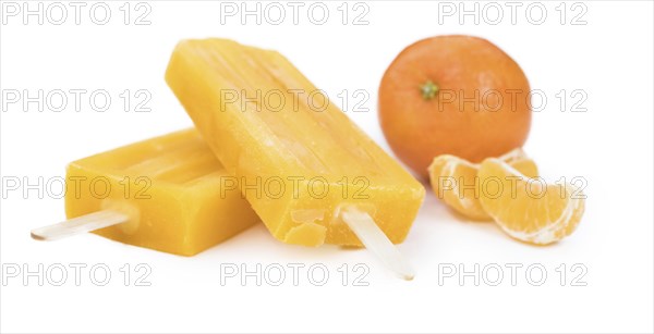 Tangerine Popsicles isolated on a white background (detailed close-up shot)