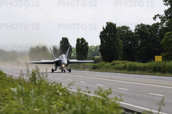 Swiss Air Force F/A 18 fighter aircraft take off and land on the A1 motorway during the Alpha Uno exercise in Payerne on Wednesday, 5 June 2024. The purpose of the military exercise is to strengthen the defence capability of the Swiss Armed Forces through so-called decentralisation. (DDPS/DDPS, Sam Bosshard)