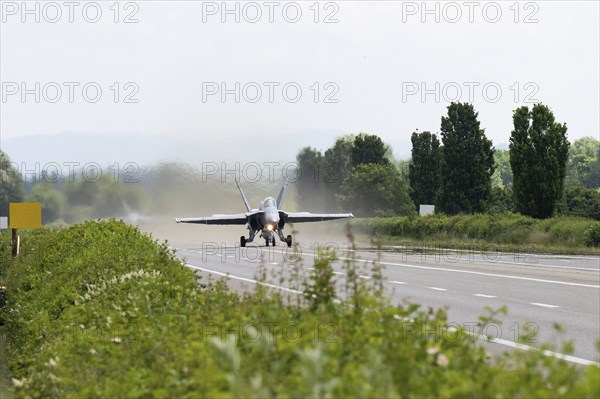 Swiss Air Force F/A 18 fighter aircraft take off and land on the A1 motorway during the Alpha Uno exercise in Payerne on Wednesday, 5 June 2024. The purpose of the military exercise is to strengthen the defence capability of the Swiss Armed Forces through so-called decentralisation. (DDPS/DDPS, Sam Bosshard)