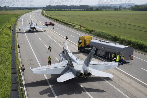 Swiss Air Force F/A 18 fighter aircraft take off and land on the A1 motorway during the Alpha Uno exercise in Payerne on Wednesday, 5 June 2024. The purpose of the military exercise is to strengthen the defence capability of the Swiss Armed Forces through so-called decentralisation. (DDPS/DDPS, Alex Kuehni)