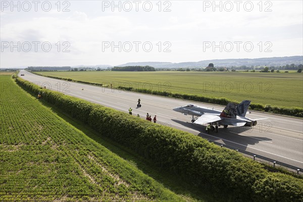 Swiss Air Force F/A 18 fighter aircraft take off and land on the A1 motorway during the Alpha Uno exercise in Payerne on Wednesday, 5 June 2024. The purpose of the military exercise is to strengthen the defence capability of the Swiss Armed Forces through so-called decentralisation. (DDPS/DDPS, Philipp Schmidli)