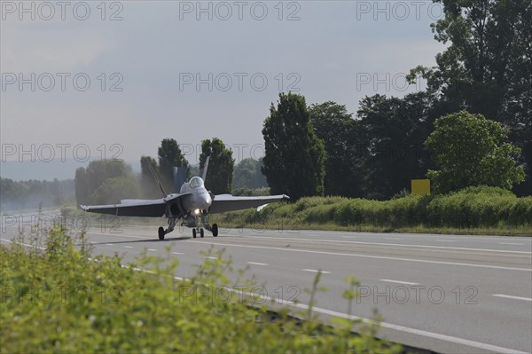 Swiss Air Force F/A 18 fighter aircraft take off and land on the A1 motorway during the Alpha Uno exercise in Payerne on Wednesday, 5 June 2024. The purpose of the military exercise is to strengthen the defence capability of the Swiss Armed Forces through so-called decentralisation. (DDPS/DDPS, Sam Bosshard)