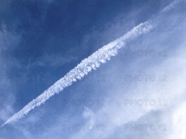 Dissipating contrail high thin cloud artificially created by aircraft engines homomutatus man-made with by jet aircraft jet aircraft jet aircraft jet turbines of passenger aircraft mistakenly chem-trails chem-trails, international