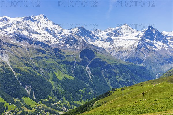 Alpine meadows at the summit of Corne de Sorebois, with the snow-covered peaks of Weisshorn, Bishorn, Zinalrothorn and Obergabelhorn in the background, Val d'Anniviers, Valais Alps, Canton Valais, Switzerland, Europe