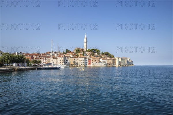 Old historic dreamy town on a beautiful island. Panorama of a romantic tourist town on a coast. Rovinj, Istria, Croatia, Europe