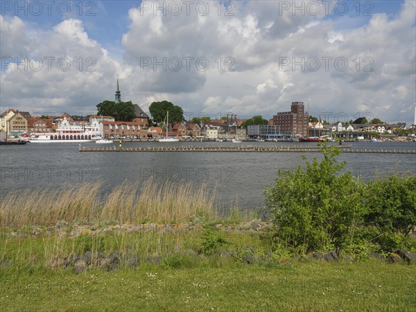 View of the town on the water with green areas and clouds, Kappeln, SChleswig-Holstein, Germany, Europe