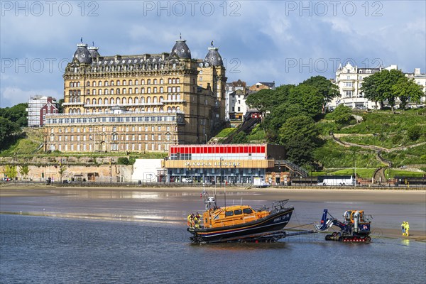 RNLI Scarborough Lifeboat Station and boat over Scarborough Beach, Scarborough, North Yorkshire, England, United Kingdom, Europe