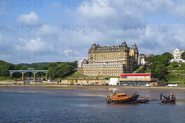 RNLI Scarborough Lifeboat Station and boat over Scarborough Beach, Scarborough, North Yorkshire, England, United Kingdom, Europe