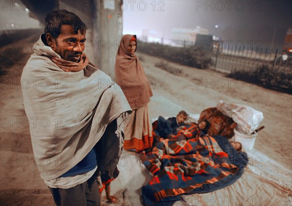 New Delhi, India, 21.01.2010, Homeless family with children. Sleeping place under a bridge, India, Asia