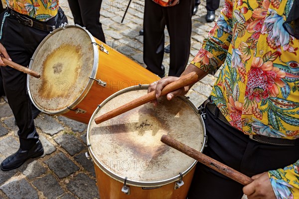 Drummers and their instruments performing during a typical street party in Brazil, Belo Horizonte, Minas Gerais, Brazil, South America