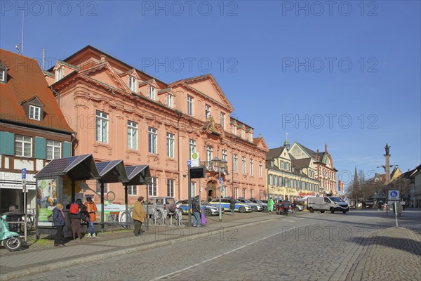 Historic royal court built in 1717 and bus stop with people, police building, main street, Offenburg, Ortenau, Northern Black Forest, Black Forest, Baden-Württemberg, Germany, Europe