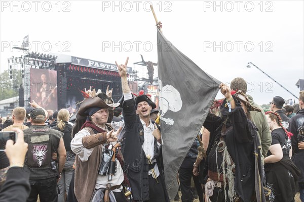 Festival visitors dressed as pirates at the Wacken Open Air in Wacken. The traditional metal festival takes place from 31 July to 3 August 2024