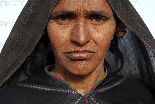 Sad woman (Gujarat, India) . She belongs to the rabari caste