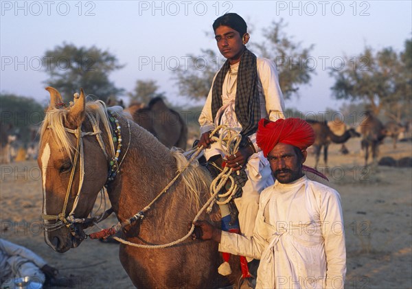 Men from the Rebari caste (Rajasthan, India), They are participating at a local fair where they sell their own livestock. Most Rebari still live in a traditional way. They are shepherd, they rear goats and dromedaries, some of them are still semi nomadic. As staunch hindus, they believe they are the descendants of the hindu god Shiva