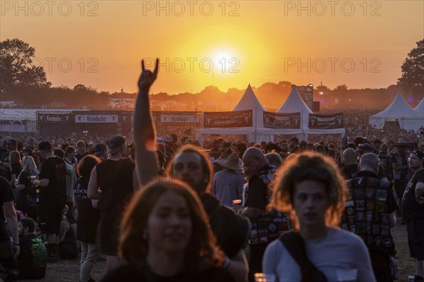 Evening atmosphere at the Wacken Open Air in Wacken. The traditional metal festival takes place from 31 July to 2 August 2024