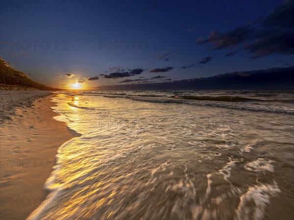 Sunset on a sandy beach on the island of Usedom on the Baltic Sea, Zempin, Mecklenburg-Western Pomerania, Germany, Europe