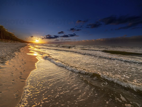 Sunset on a sandy beach on the island of Usedom on the Baltic Sea, Zempin, Mecklenburg-Western Pomerania, Germany, Europe