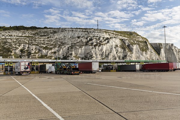 Trucks waiting in the ferry terminal, chalk cliffs, Dover, Kent, England, United Kingdom, Europe