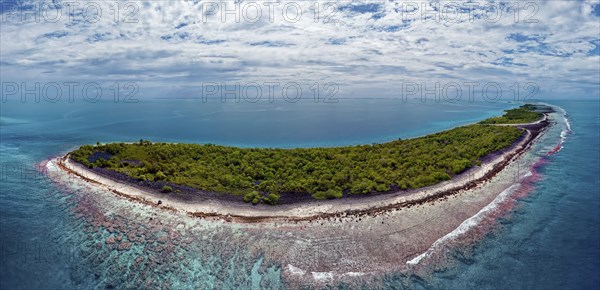 Aerial view of uninhabited island in Fakarava Atoll, typical island landscape, front outer reef, Fakarava Atoll, Tuamotu Archipelago, Tahiti, Society Islands, Leeward Islands, French Polynesia, Oceania