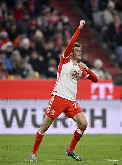 Goal celebration, cheering Thomas Müller FC Bayern München FCB (25) Advertising banner WÜRTH, Logo, Allianz Arena, Munich, Bavaria, Germany, Europe