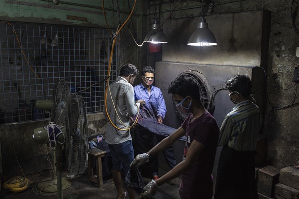 Worker in a denim dyeing factory, textile industry, Dhaka, Bangladesh, Asia