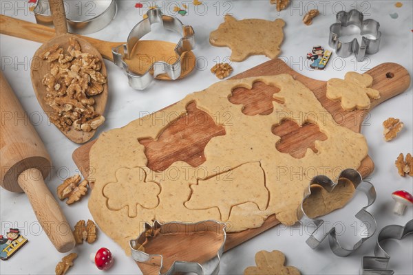 Biscuit baking, cutting out biscuits for New Year, shamrocks and pigs, baking accessories