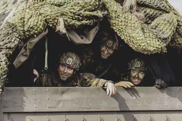 Czech soldiers drive through a forest as part of the military exercise 'Wettiner Schwert' with German and Czech soldiers near Tangermünde, 26 March 2024. 'Wettiner Schwert' is part of the NATO Quadriga exercise