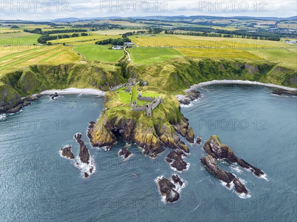 Aerial view of Dunnottar Castle ruins on the North Sea coast, Stonehaven, Aberdeenshire, Scotland, United Kingdom, Europe