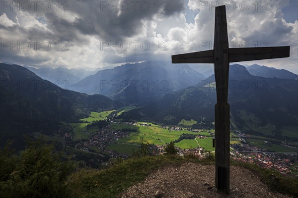 Hirschbergkreuz, Kleiner Hirschberg, view of Bad Oberdorf and Bad Hindelang and the AllgÃ¤u Alps, dramatic clouds, thunderstorm atmosphere, OberallgÃ¤u, AllgÃ¤u, Bavaria, Germany, Europe