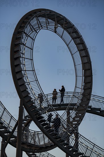 Landmark Angerpark Tiger & Turtle, Magic Mountain, walk-in sculpture in the form of a rollercoaster on the Heinrich-Hildebrand-Höhe spoil tip, HKM steelworks, sunset, Duisburg, North Rhine-Westphalia, Germany, Europe