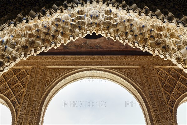 Arabesque Moorish stalactites or muqarnas in the Sala de los Abencerrajes, Nasrid Palaces, Alhambra, Granada, Andalusia