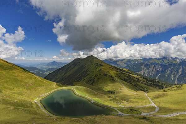 Riezler Alpsee, an artificial lake, snow pond, feeds the snow cannons that completely cover the slopes of the Fellhorn and Kanzelwand cable cars with snow, behind it the Fellhorn, 2038m, AllgÃ¤u Alps, Bavaria, Germany, Europe