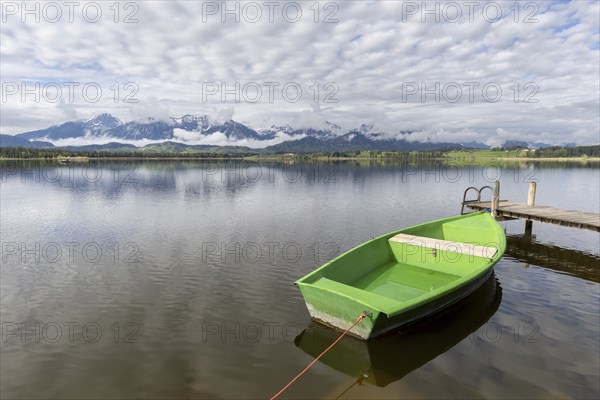 Rowing boat at sunrise, Hopfensee, Hopfen am See, near Füssen, OstallgÃ¤u, AllgÃ¤u, Bavaria, Germany, Europe