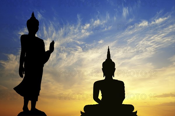 Two Buddha silhouettes in front of sunset, Ko Samui, Thailand, Asia