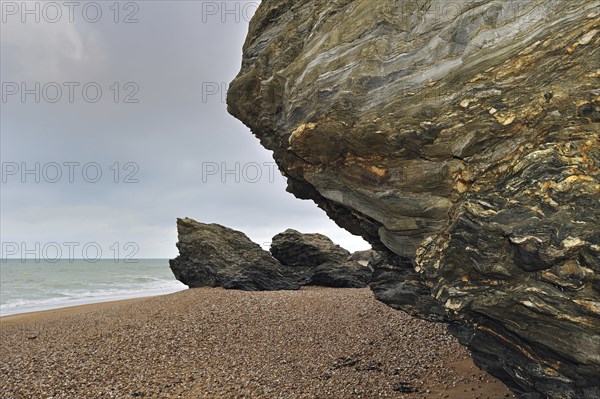 Pebble beach and eroded rocks at Saint-Hilaire-de-Riez, La Vendée, Pays de la Loire, France, Europe