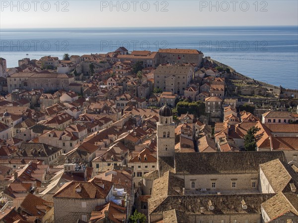 Panoramic view of a historic old town with brick roofs and the sea in the background, Dubrovnik, Mediterranean Sea, Croatia, Europe