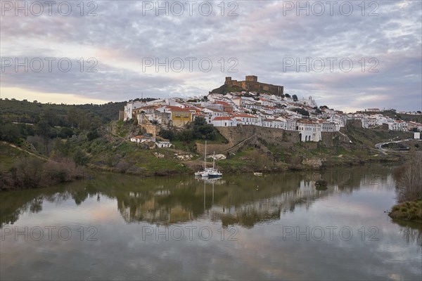 Mertola city view at sunset with Guadiana river in Alentejo, Portugal, Europe