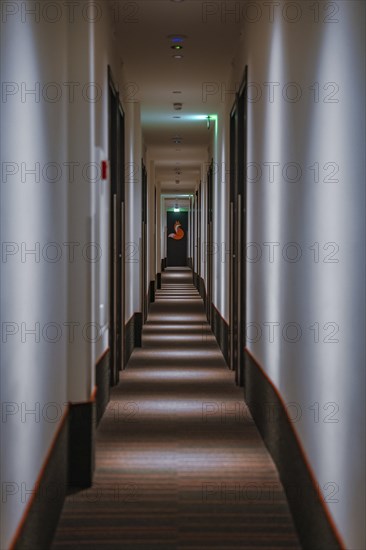 Narrow narrow corridor of a low budget hotel, The Fox, The Hague, Netherlands