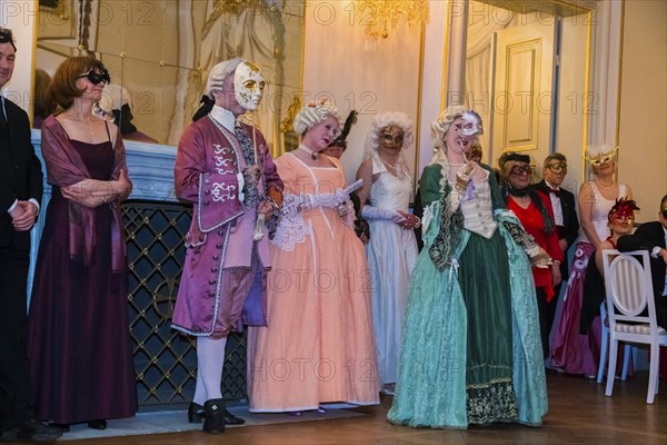 Masquerade ball at Rammenau Baroque Palace, Rammenau Palace in Rammenau near Bischofswerda in the district of Bautzen is one of the most beautiful preserved Baroque country palaces in Saxony. The les danseurs de Sans Souci as guests at the masked ball. With their historical dances, the costumed performers were a highlight of the evening