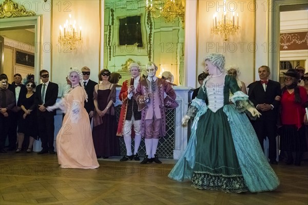 Masquerade ball at Rammenau Baroque Palace, Rammenau Palace in Rammenau near Bischofswerda in the district of Bautzen is one of the most beautiful preserved Baroque country palaces in Saxony. The les danseurs de Sans Souci as guests at the masked ball. With their historical dances, the costumed performers were a highlight of the evening