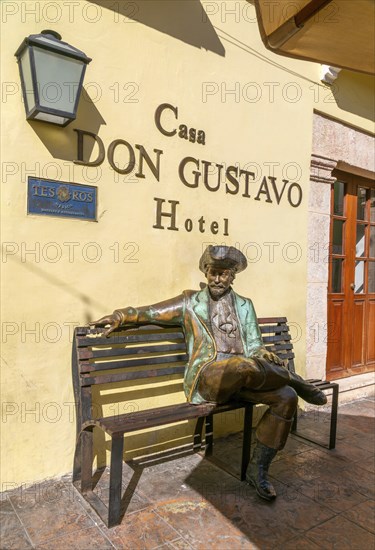 Bronze sculpture of male seafarer outside Casa Don Gustavo hotel, Campeche city, Campeche State, Mexico, Central America