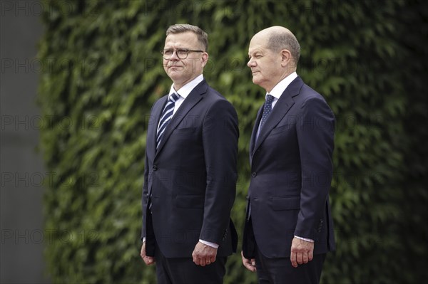 (R-L) Olaf Scholz, Federal Chancellor, receives. Petteri Orpo, Prime Minister of the Republic of Finland, with military honours at the Federal Chancellery. Berlin, 14.07.2023., Berlin, Germany, Europe