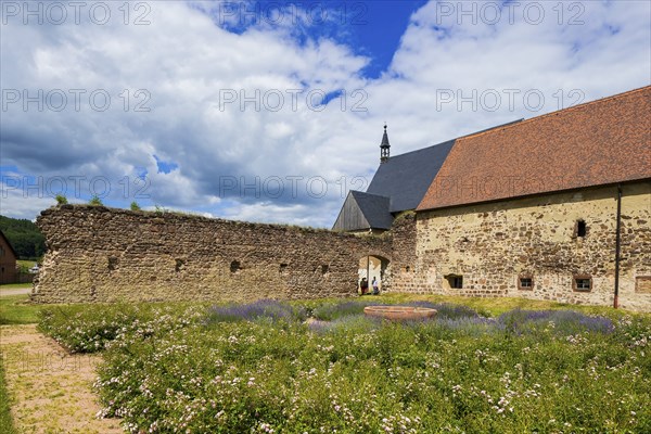 DEU Saxony Klosterbuch Area of the former cloister with Romanesque fountain bowl in the Kreugarten Buch Monastery is a former Cistercian monastery founded as St. Mary's Monastery in the 12th century. After the Reformation, it and its lands became a purely agricultural enterprise