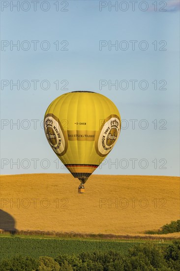 Summer balloon flight over the foothills of the Osterzgebirge mountains