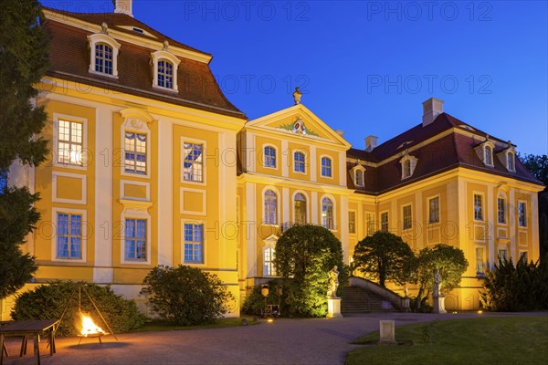 Baroque Rammenau Castle in Lusatia, on a summer evening. Rammenau Castle in Rammenau near Bischofswerda in the district of Bautzen is one of the best-preserved baroque country castles in Saxony. The grounds include the cour d'honneur, cavalier houses, manor house and park