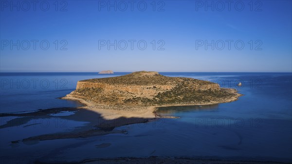 Drone image, aerial view of a large island with a steep rocky coast, surrounded by clear blue sea, Gramvoussa, Gramvoussa peninsula, Pirate Bay, Balos, lagoon, north-west Crete, Crete, Greek Islands, Greece, Europe