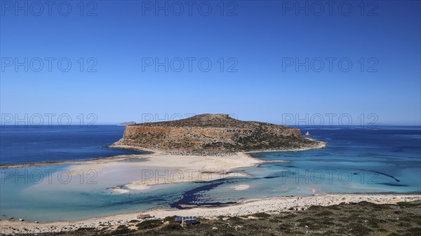 Large island surrounded by a clear blue sea under an unclouded sky, natural beauty, Gramvoussa, Gramvoussa peninsula, pirate bay, Balos, lagoon, north-west Crete, Crete, Greek islands, Greece, Europe