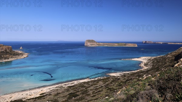 Panoramic view of a coastline with blue sea and island, Venetian Sea Fortress, Gramvoussa, Gramvoussa Peninsula, Pirate Bay, Balos, Lagoon, Northwest Crete, Crete, Greek Islands, Greece, Europe