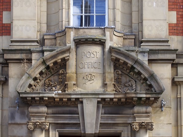 Scarborough, North Yorkshire, United Kingdom, 10 September 2022: sign above the stone doorway of the closed former post office in scarborough, Europe