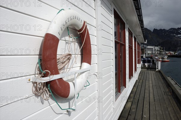 Lifebuoy at the harbour in Henningsvär, Austvagöy, Lofoten, Norway, Europe